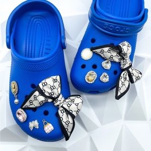 Bow and flower gemstones croc charm set . Charms only ! Crocs not included.